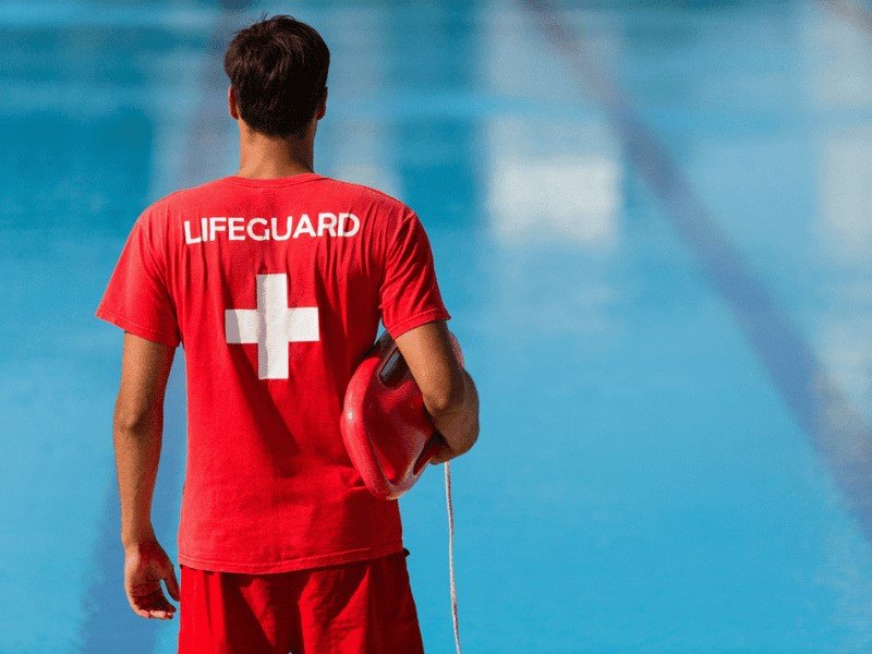The bright visibility of a lifeguard's outfit makes it simpler for others to spot them in the community.
