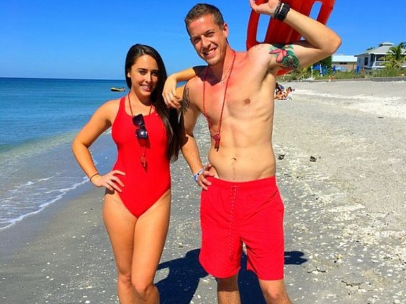 The modern lifeguard costume is influenced by prevailing fashion trends.