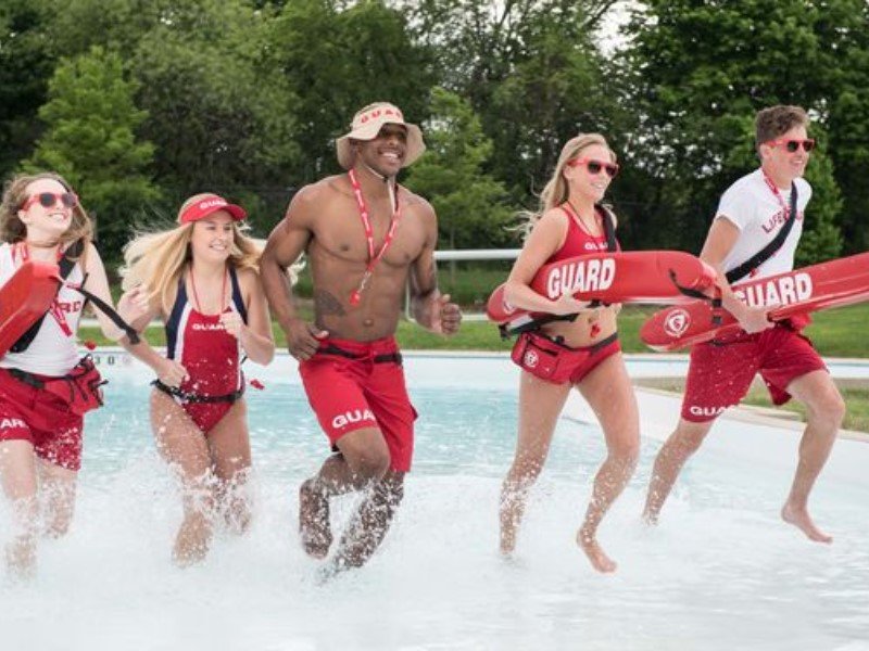 The traditional lifeguard uniform has a timeless style.